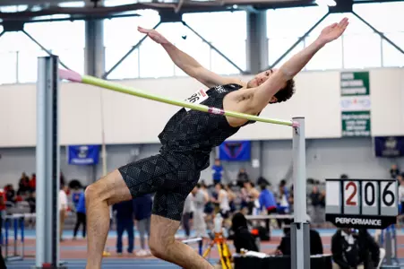 Jon Migancca jumping over high jump bar at the 2026 Big East Indoor Track Championships