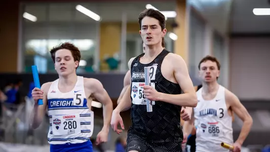 William Johnston running the relay at 2026 Big East Indoor Track Championships