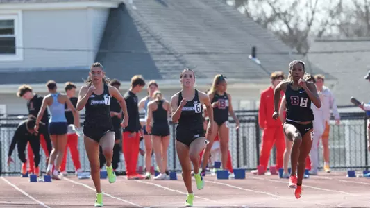 Ava Russel sprinting the 100 meter race