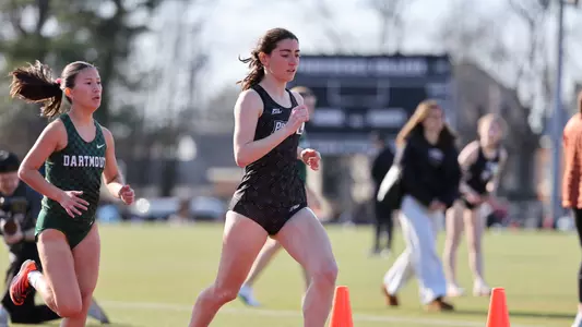 Emily DiSarno racing at the Friar Invitational 