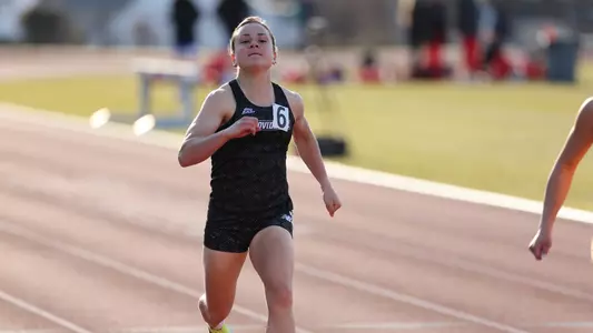 Jenna Jacobs running at the Friar Invitational