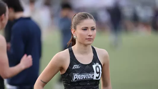 Chloe Higgins warming up at Friar Invitational 