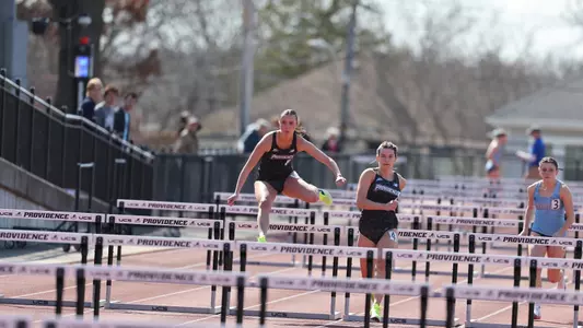 Brittion Miller hurdling at the Friar invitational