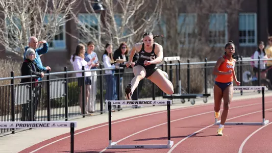 Ella Chandaria hurdling at Friar Invitational 