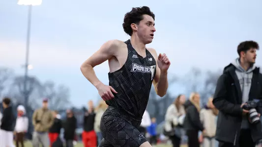 Eliott Pugh racing the mile at the Friar invitational 