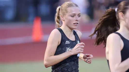 Gabby Schmidt racing the 5000 meter race at Friar invitational 