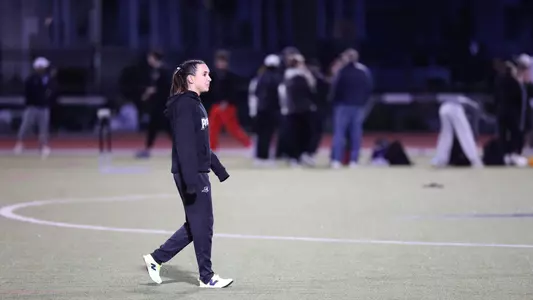 Emily Bush warming up for 3000 meter race 