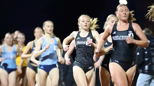 Emilia O'Leary racing the 3000 meter race at Friar Invitational 