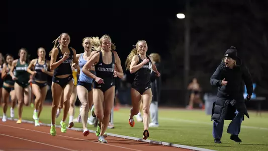 Emilia O'Leary racing the 3000 meter race at Friar Invitational 