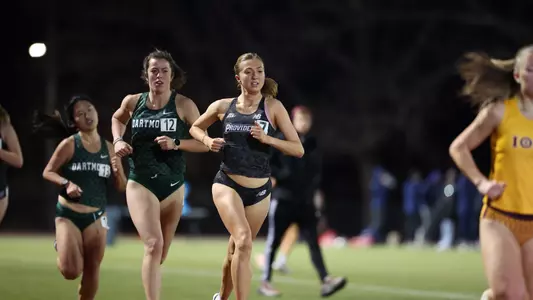 Emilia O'Leary racing the 3000 meter race at Friar Invitational 