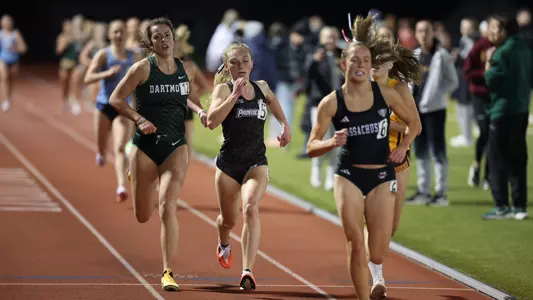 Emilia O'Leary racing the 3000 meter race at Friar Invitational 