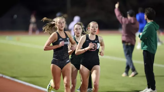 Kaleigh Higgins racing the 3000 meter race at Friar Invitational 