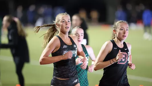 Kaleigh Higgins racing the 3000 meter race at Friar Invitational 