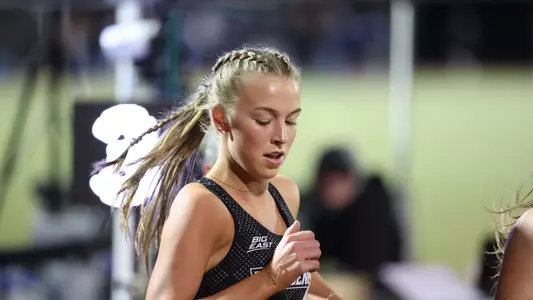 Kaleigh Higgins racing the 3000 meter race at Friar Invitational 