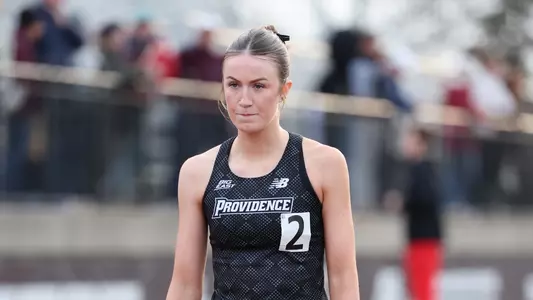 Gemma Galvin lining up before the 800 meter race at Friar Invitational 
