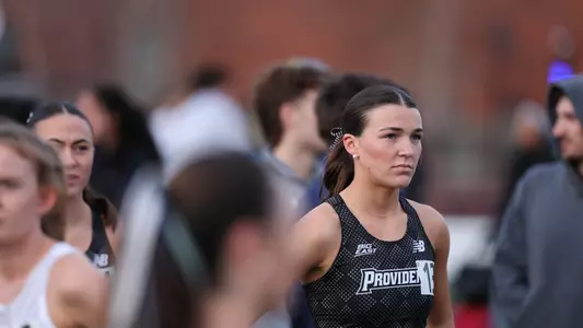 Polly Bogdan warming up for race at Friar Invitational 