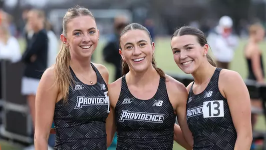 Polly Bogdan with teammates at Friar Invitational 