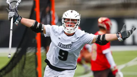 Richie Jospeh celebrates scoring the game-winning goal in overtime with his arms out holding his stick versus Denver on Chapey Field at Anderson Stadium. 