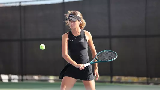 Women's Tennis' Sophie Ahlberg in action against Assumption