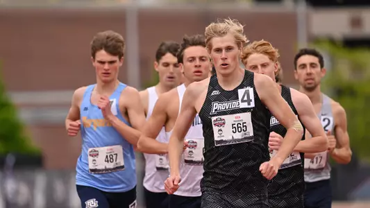 Liam back racing the 1500 meter semi finals at Big East Championships 