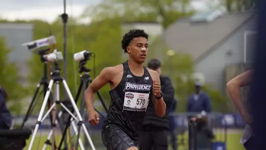 Owen Conmiskey racing at the Big East Championship 