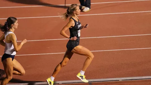 Anna Gardiner competing in the 5000 meter at the Big East Championships 