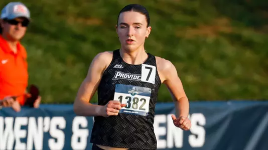 Women's track runner Maeve O'Neill running the 800 meters at the NCAA First Round