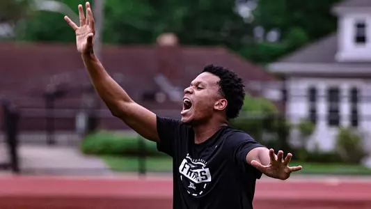 Gavin Hightower practicing defense during a turf workout