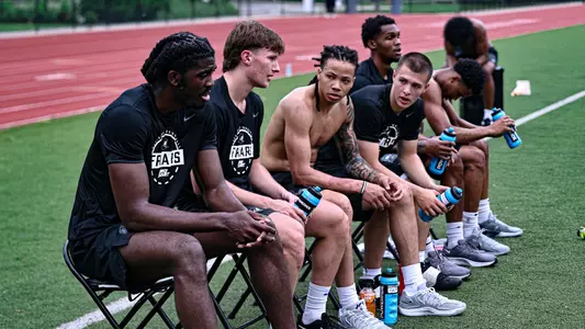 Samson Aletan, Ryan Sabol, Malik Mack & John Jackson getting rest during tough workout