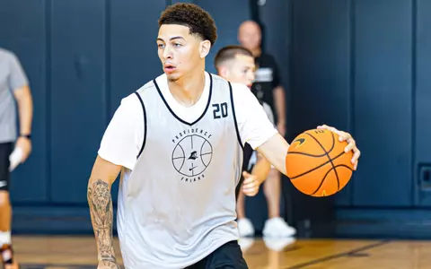 Miles Byrd pictured taking the ball down the court during practice 6/16