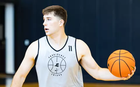 Ryan Mela pictured during practice 6/16 with possession of the ball 