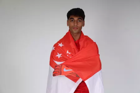 Karan Sobti flag wrapped around while posing 