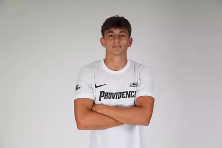 Sam Montalto crossing his arms and facing the camera 