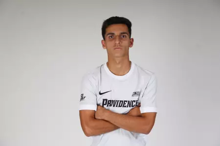 Michael Vella arms crossed facing forward 