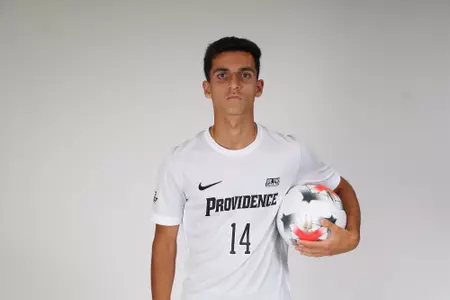 Michael Vella ball on hip while facing the camera 