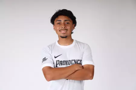 Luis Gutierrez arms crossed facing the camera 