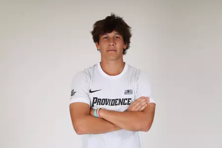 Jack Slade arms crossed facing the camera posed