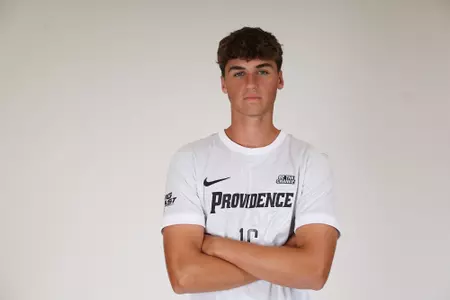 Jack Klein arms crossed facing the camera 