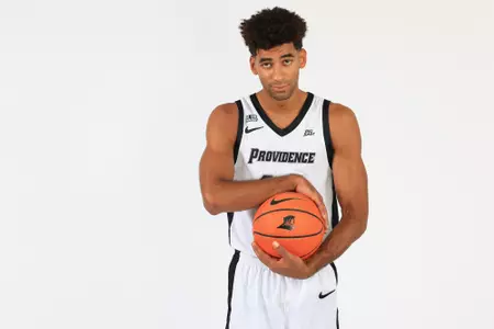 Leonardo Marangon holds the basketball during a photo shoot.