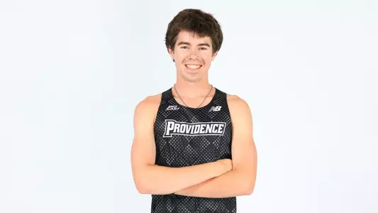 David Hayes posing with his arms crossed during a photo shoot 