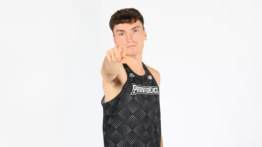 Cormac Dixon pointing to the camera during a photo shoot