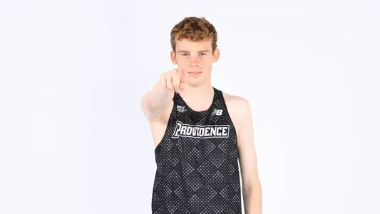 Liam McCay pointing to the camera during a photo shoot