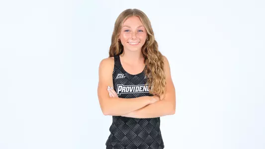 Emilia O'Leary posing with her arms crossed during a photo shoot 