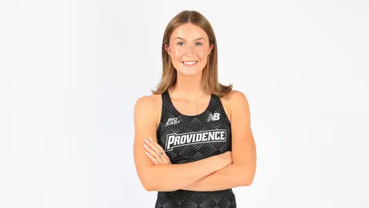 Gemma Galvin posing with her arms crossed during a photo shoot 