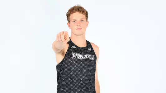 Ryan Welch pointing towards the camera during a photo shoot 
