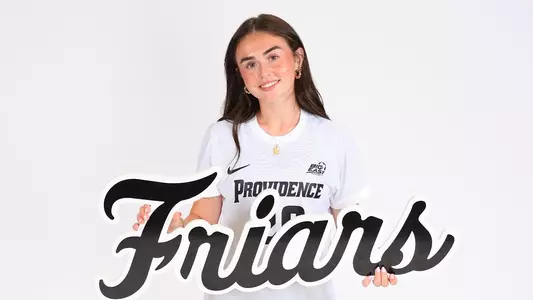 Makenna Foley Holding Friars Sign Posing