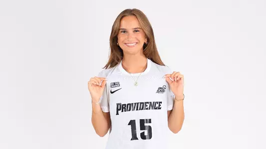 Georgia Christos Holding Out Jersey Number Posing