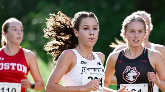 Maggie Slattery racing at Friar Invitational 