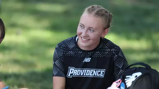 Shea Podbelski warming up for Friar Invitational 