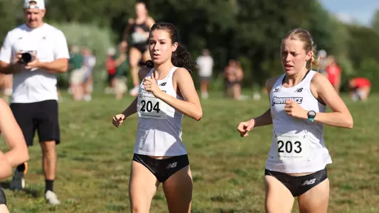 Maggie Slattery racing at Friar Invitational 